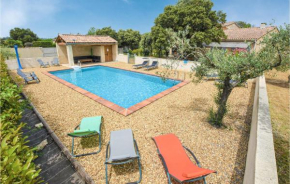 Amazing home in Mazan with Outdoor swimming pool and 4 Bedrooms